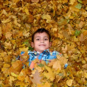 Samuel playing in the leaves!